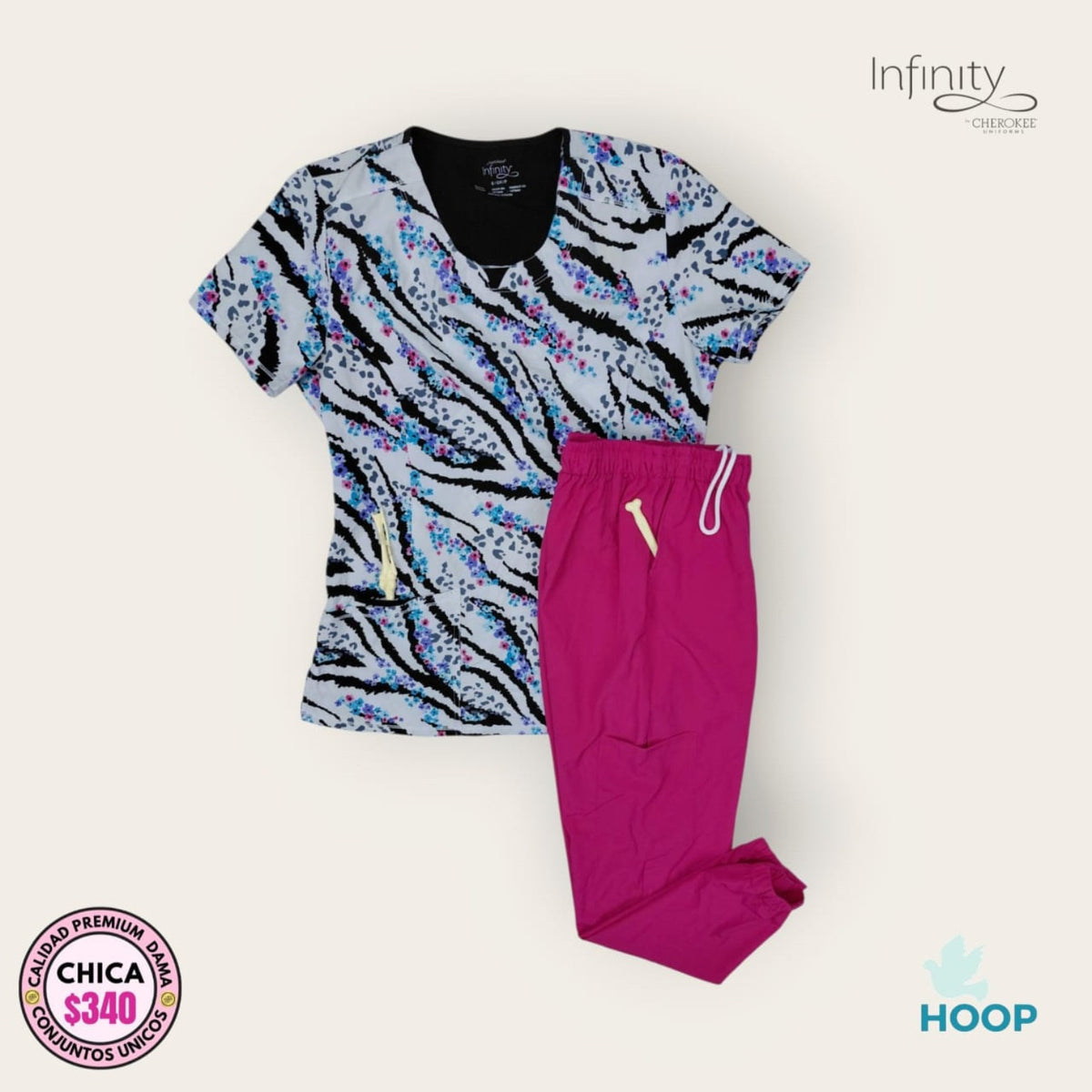 Conjunto médico Cherokee Infinity estampado con pantalón fucsia | Dama Chica, uniforme médico premium talla Chica