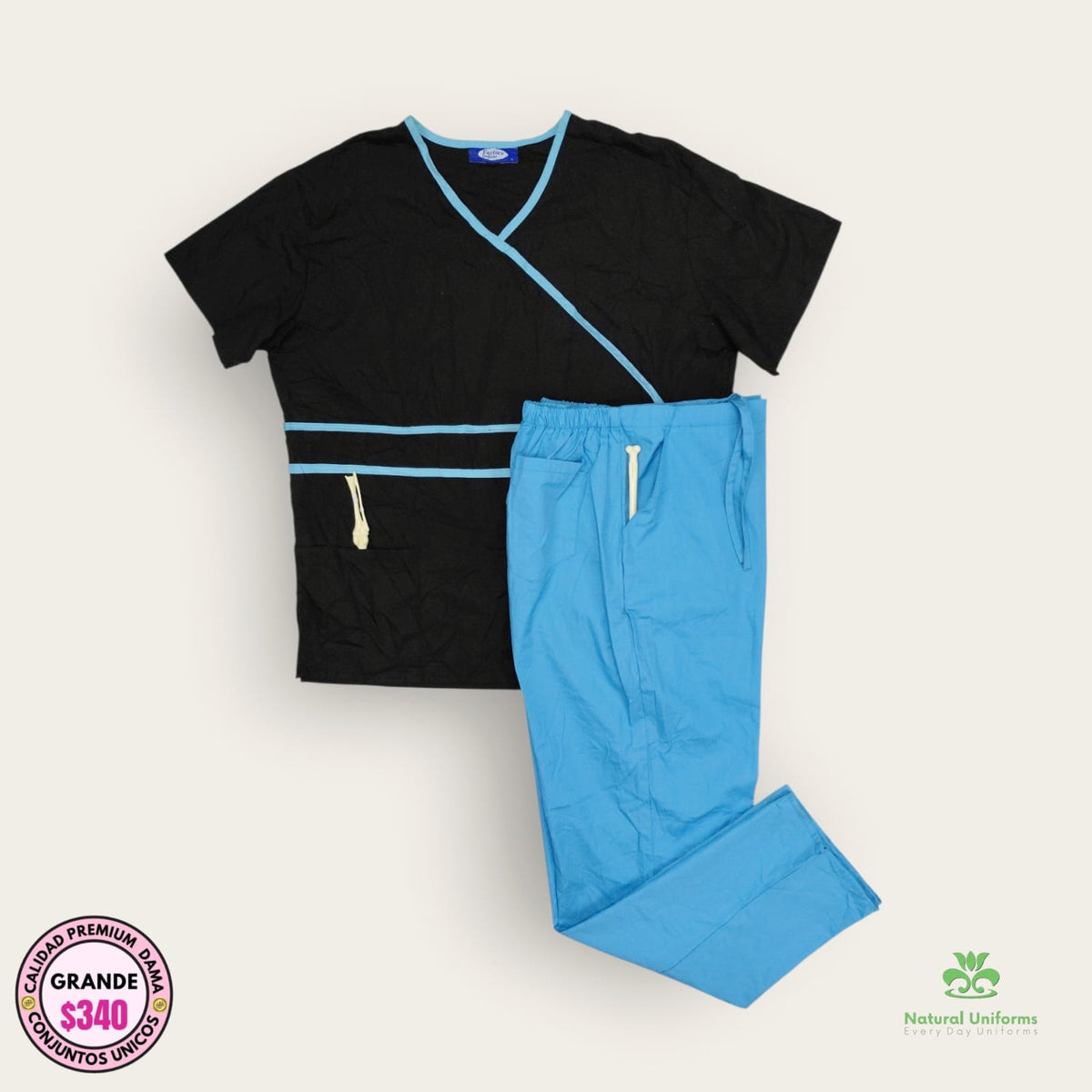 Conjunto médico Natural Uniforms negro y turquesa, talla grande para dama, disponible en Uniformes MID.