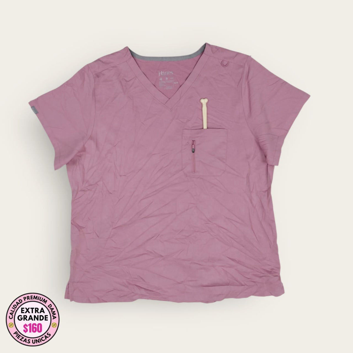 Filipina médica Hanes rosa con bolsillo de cierre, talla extragrande para dama, disponible en Uniformes MID.