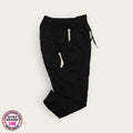 Pantalón médico negro de pretina elástica, talla extragrande para dama, disponible en Uniformes MID.
