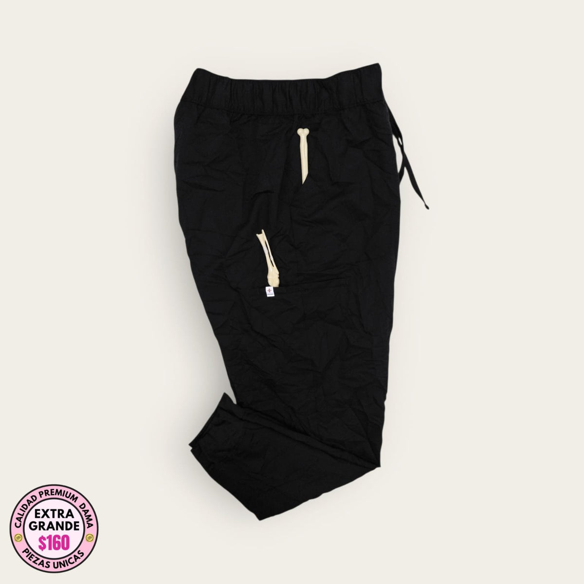 Pantalón médico negro de pretina elástica, talla extragrande para dama, disponible en Uniformes MID.