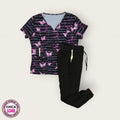 Conjunto médico premium estampado rosa y negro con pantalón negro | Dama S