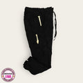 Pantalón médico premium negro con cordón, talla mediana para dama; vista de la prenda disponible en Uniformes MID.