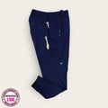 Pantalón médico premium azul marino con cordón, talla mediana para dama; vista de la prenda disponible en Uniformes MID.
