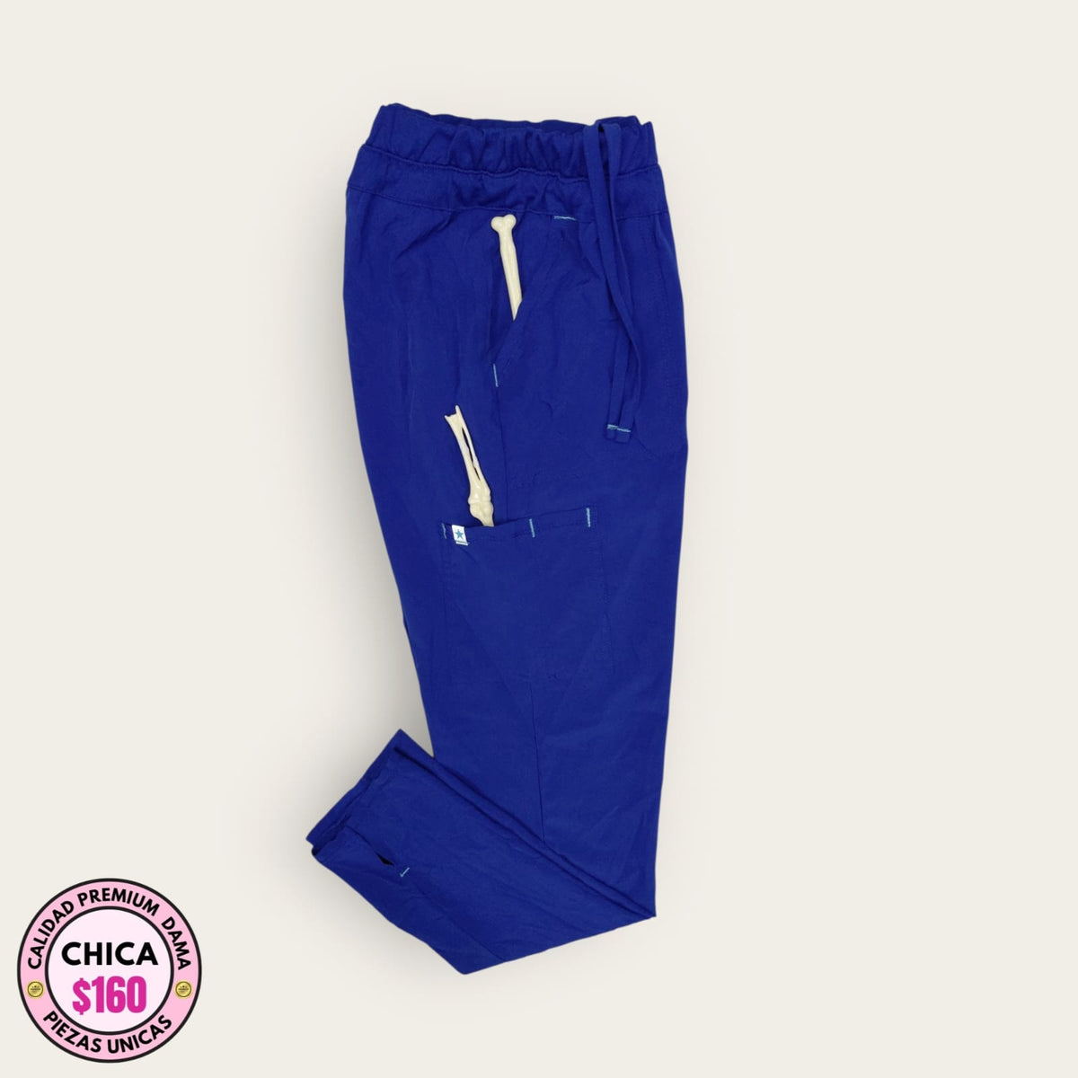 Pantalón médico premium azul marino con cordón, talla chica para dama, disponible en Uniformes MID.