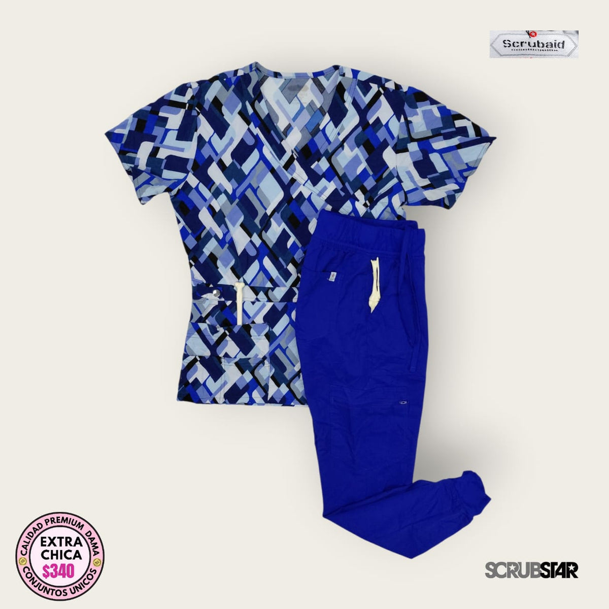 Conjunto médico premium estampado geométrico azul con pantalón azul rey | Dama XS